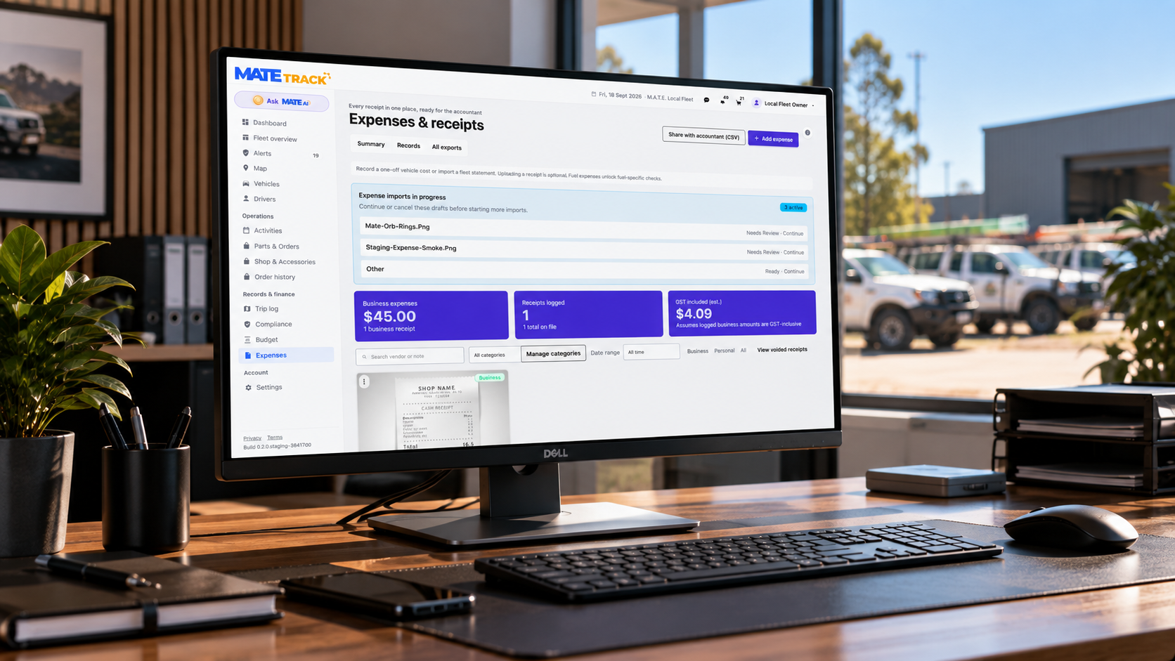 M.A.T.E. Track expenses and receipts on a desktop monitor in a fleet office, business expenses and GST ready to export for the accountant